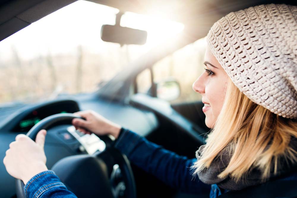 Student taking driving lesson